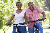 senior couple on cycle ride in countryside
