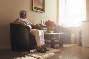 woman looking out window