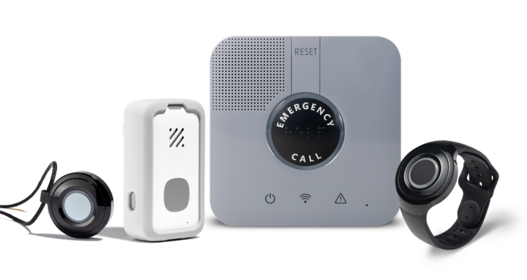 Set of medical alert devices, including a wearable pendant, wristband, and emergency call unit, representing safety and independence promoted by the Positive Aging Quotient.
