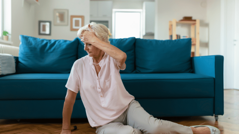 Senior woman on floor