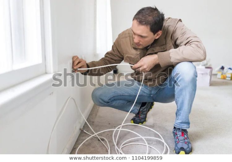 https://www.shutterstock.com/image-photo/young-man-installing-television-cable-internet-1104199859