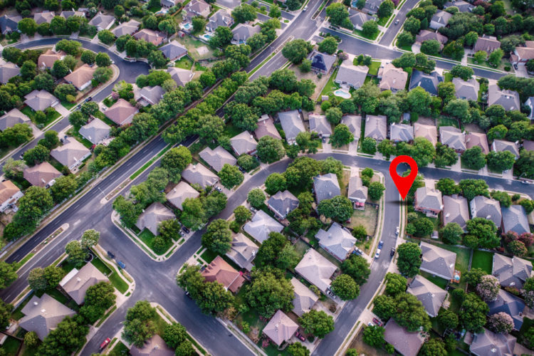 Aerial map placed with pin in neighborhood with houses