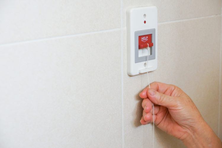 Medical alert pull cord in shower