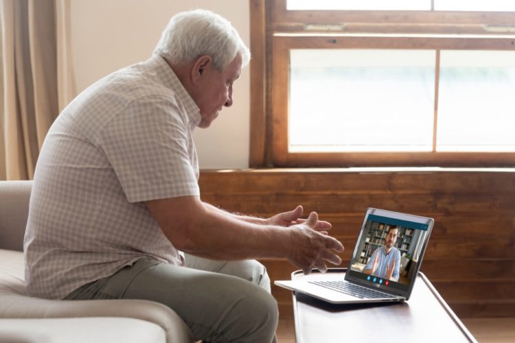 Older man on video chat