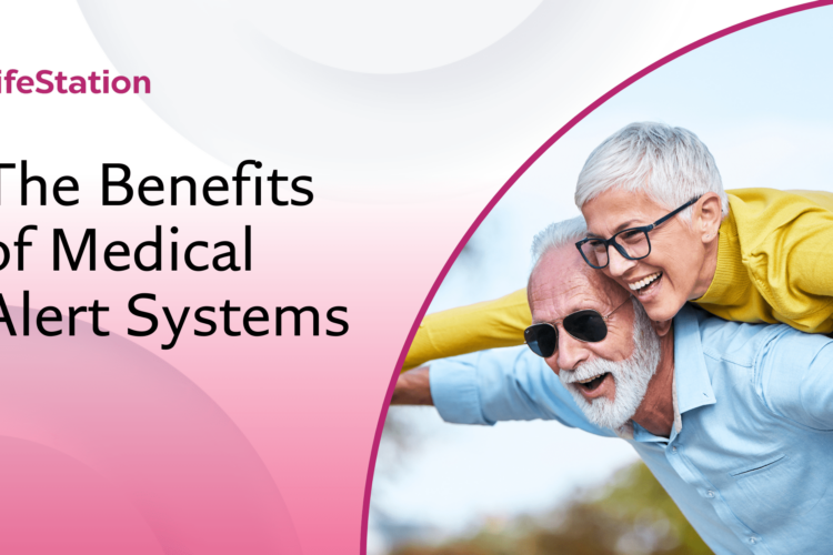 blog banner: the benefits of medical alert systems. Image of a happy couple using a medical alert system feeling independent.